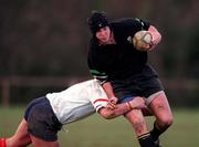 27 February 1999; Bruce Wood of DSLP is tackled by Paul Henderson of Malone during the AIB All-Ireland League Division 2 match between DLSP and Malone at Kilternan Park in Dublin. Photo by Ray McManus/Sportsfile