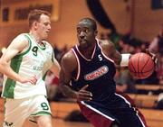 27 February 1999; Calvin Morris of Denny Notre Dame in action against Pascal Bree of Sligo during the ESB Men's Superleague match between Denny Notre Dame and Sligo at the National Basketball Arena in Dublin. Photo by Brendan Moran/Sportsfile