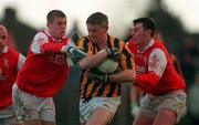 21 February 1999; Donal Murtagh of Crossmaglen Rangers in action against Brian Carbery, left, and Tom Nolan of Éire Og during the AIB All-Ireland Senior Club Football Championship Semi-Final match between Crossmaglen Rangers and Éire Og at Páirc Tailteann in Navan, Meath. Photo by Brendan Moran/Sportsfile
