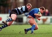 13 February 1999; Eugene Gibney of St Mary's College is tackled by Conor Burke of Shannon RFC during the AIB All-Ireland League Division 1 match between St Mary's College and Shannon RFC at Templeville Road in Dublin. Photo by Brendan Moran/Sportsfile