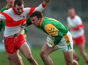28 Feburary 1999; Evan Kelly of Meath in action against David O'Neill of Derry during the Church and General National Football League Division 1 match between Meath and Derry at Páirc Tailteann in Navan, Meath. Photo by Ray McManus/Sportsfile