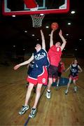 10 March 1999; Finnian Bannan of St Eunan's, Letterkenny, Donegal, shoots for a score despite the attention of Niall O'Mahony of Intermediate School, Killorglin, Kerry, during the All Ireland School Boys Basketball Final match between Letterkenny and Killorglin at the National Basketball Arena in Dublin. Photo by Aoife Rice/Sportsfile