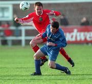 21 March 1999; Gareth Cronin of Cork City in action against Graham Brett of UCD during the Bord Gáis National League Premier Division match between UCD and Cork City at Belfield Park in Dublin. Photo by David Maher/Sportsfile