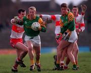 28 Feburary 1999; Graham Geraghty of Meath in action against Declan Bateson of Derry during the Church and General National Football League Division 1 match between Meath and Derry at Páirc Tailteann in Navan, Meath. Photo by Aoife Rice/Sportsfile