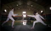 14 March 1999; Brendan Twomey, left, of DUFC, in action against Eamon McGrattan of UCD, during the Mens Epee Direct elimination at the Irish National Fencing Championships at Roadstone Sports Complex in Dublin. Photo by Damien Eagers/Sportsfile