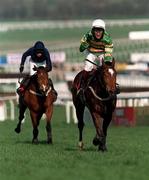 16 March 1999; Jockey Charlie Swan celebrates on Istabraq after winning The Smurfit Champion Hurdle Challenge Trophy, ahead of Theatreworld, with Tom Treavy up, during day one of the Cheltenham Racing Festival at Prestbury Park in Cheltenham, England. Photo by Damien Eagers/Sportsfile