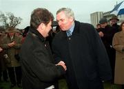 24 January 1999; An Taoiseach Bertie Ahern, right, congratulates Istabraq owner JP McManus after winning the AIG Championship Hurdle at Leopardstown Racecourse in Dublin. Photo by Ray McManus/Sportsfile