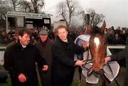 24 January 1999; Istabraq and owner JP McManus after winning the AIG Championship Hurdle at Leopardstown Racecourse in Dublin. Photo by Ray McManus/Sportsfile
