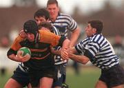 27 February 1999; Joseph McVeigh of Buccaneers in action against Shane Byrne, left, and Nicky Assaf of Blackrock College during the AIB All-Ireland League Division 1 match between Blackrock College and Buccaneers at Stradbrook Road in Blackrock, Dublin. Photo by Matt Browne/Sportsfile