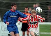 28 February 1999; Eamon McLoughlin of UCD in action against Mark Hutchison of Sligo Rovers during the Harp Lager National League Premier Division match between UCD and Sligo Rovers at Belfield Park in Dublin. Photo by David Maher/Sportsfile