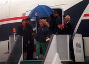 6 August 1998; Olympic swimmer Michelle Smith disembarks the plane on her arrival in Dublin after the 1996 Olympic games where she won three gold medals and one bronze medal. Photo by David Maher/Sportsfile