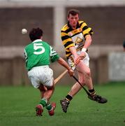 28 February 1999; Nigel Higgins of Rathnure in action against Martin Coulter Snr of Ballygalget during the AIB All-Ireland Senior Club Hurling Championship Semi-Final match between Rathnure and Ballygalget at Parnell Park in Dublin. Photo by Damien Eagers/Sportsfile