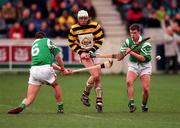 28 February 1999; Paul Codd of Rathnure in action against Michael Pucci, left, and Barry Smyth of Ballygalget during the AIB All-Ireland Senior Club Hurling Championship Semi-Final match between Rathnure and Ballygalget at Parnell Park in Dublin. Photo by Damien Eagers/Sportsfile