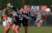 21 February 1999; Philip Smith and Senan Hehir of Doonbeg in action against Liam McHale of Ballina Stephenites during the AIB All-Ireland Senior Club Football Championship Semi-Final match between Ballina Stephenites and Doonbeg at Duggan Park in Ballinasloe, Galway. Photo by Matt Browne/Sportsfile