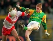 28 Feburary 1999; Raymond Magee of Meath in action against David O'Neill of Derry during the Church and General National Football League Division 1 match between Meath and Derry at Páirc Tailteann in Navan, Meath. Photo by Ray McManus/Sportsfile
