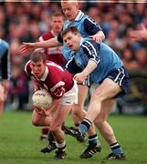 14 March 1999; Richie Fahy of Galway in action against Dessie Farrell and Declan Darcy of Dublin during the Church and General National Football League Division 1 match between Dublin and Galway at Parnell Park in Dublin. Photo by Brendan Moran/Sportsfile