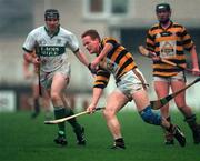 13 December 1998; Rod Guiney of Rathnure in action against John Gleeson of Portlaoise during the AIB Leinster Club Hurling Championship Final match between Rathnure and Portlaoise at Nowlan Park in Kilkenny. Photo by Ray McManus/Sportsfile