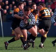 27 February 1999; Shane Byrne of Blackrock College in action against Owen Cobb, left, and Simon Alnutt of Buccaneers during the AIB All-Ireland League Division 1 match between Blackrock College and Buccaneers at Stradbrook Road in Blackrock, Dublin. Photo by Matt Browne/Sportsfile