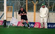 21 February 1999; Referee Pat Horan moves away to resume his duties after discussing Athenry's claim for a last minute point with the match umpire during the AIB All-Ireland Senior Club Hurling Championship Semi-Final match between St Joseph's Doora Barefield and Athenry at Semple Stadium in Thurles, Tipperary. Photo by Damien Eagers/Sportsfile