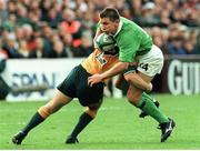 10 October 1999; Justin Bishop, Ireland, in action against Tim Horan, Australia. 1999 Rugby World Cup, Ireland v Australia, Lansdowne Road, Dublin. Picture credit: Brendan Moran / SPORTSFILE