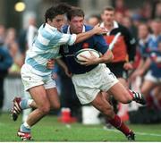24 October 1999; Olivier Magne, France, is tackled by Agustin Pichot, Argentina. 1999 Rugby World Cup, France v Argentina, Lansdowne Road, Dublin. Picture credit: Brendan Moran / SPORTSFILE