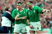 10 October 1999; Ireland 's Trevor Brennan and captain Dion O'Cuinneagain dispute a point with Referee Clayton Thomas. 1999 Rugby World Cup, Ireland v Australia, Lansdowne Road, Dublin. Picture credit: Matt Browne / SPORTSFILE