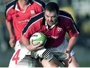 20 November 1999; Anthony Foley, Munster, is tackled by Will James, Pontypridd. Heineken European Cup, Munster v Pontypridd, Thomond Park, Limerick. Picture credit: Ray Lohan / SPORTSFILE