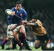 6 November 1999; Arnaud Costes, France, in action against George Gregan and Toutai Kefu, Australia. 1999 Rugby World Cup, Australia v France, Millennium Stadium, Cardiff, Wales. Picture credit: Matt Browne / SPORTSFILE
