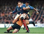 6 November 1999; Emile N'tamack, France, in action against Joe Roff, Australia. 1999 Rugby World Cup, Australia v France, Millennium Stadium, Cardiff, Wales. Picture credit: Matt Browne / SPORTSFILE