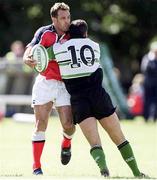 14 August 1999; Mike Mullins, Munster, is tackled by Connacht's Eric Elwood. Interprovincial Rugby Championship, Connacht v Munster, The Sportsground, Galway. Picture credit: Brendan Moran / SPORTSFILE