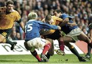 6 November 1999; Ben Tune, Australia, supported by team-mate Jason Little, no.16, goes for the tryline as France's Xavier Garbajosa, no.15, and Raphael Ibanez attempt to stop him. 1999 Rugby World Cup, Australia v France, Millennium Stadium, Cardiff, Wales. Picture credit: Matt Browne / SPORTSFILE
