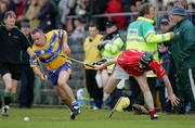 17 April 2005; Colin Lynch, Clare, in action against Kieran Murphy, Cork. Allianz National Hurling League, Division 1, Round 2, Clare v Cork, Cusack Park, Ennis, Co. Clare. Picture credit; Kieran Clancy / SPORTSFILE