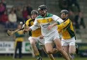 23 April 2005; Gary Hanniffy, Offaly, in action against Martin Horan, left, and Gerard O'Neill, Meath. Allianz National Hurling League, Division 2 Promotion Section, Offaly v Meath, St. Brendan's Park, Birr, Co. Offaly. Picture credit; Matt Browne / SPORTSFILE