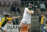 23 April 2005; Joe Brady, Offaly, in action against Martin Horan, Meath. Allianz National Hurling League, Division 2 Promotion Section, Offaly v Meath, St. Brendan's Park, Birr, Co. Offaly. Picture credit; Matt Browne / SPORTSFILE