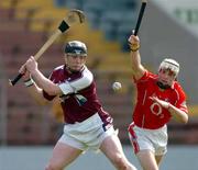 24 April 2005; Eugene Cloonan, Galway, in action against Kevin Hartnett, Cork. Allianz National Hurling League, Division 1, Round 3, Cork v Galway, Pairc Ui Chaoimh, Cork. Picture credit; David Maher / SPORTSFILE
