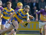 24 April 2005; Seam McMahon, Clare, in action against Eoin Quigley, Wexford. Allianz National Hurling League, Division 1, Round 3, Wexford v Clare, Wexford Park, Wexford. Picture credit; Matt Browne / SPORTSFILE