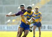 24 April 2005; Tony Carmody, Clare, in action against Darren Stamp, Wexford. Allianz National Hurling League, Division 1, Round 3, Wexford v Clare, Wexford Park, Wexford. Picture credit; Matt Browne / SPORTSFILE