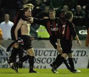 25 April 2005; Longford Town's Stephen Paisley, no shirt, is congratulatred by team-mates, Paul Keegan, left, Shane Barrett, right, and Dessie Baker, 7, after scoring his sides winning goal late in the game. Setanta Cup, Group 1, Longford Town v Glentoran, Flancare Park, Longford. Picture credit; Pat Murphy / SPORTSFILE