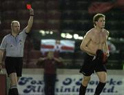 25 April 2005; Longford Town's Stephen Paisley, is sent off by referee Dave McKeown after scoring his sides winning goal late in the game. Setanta Cup, Group 1, Longford Town v Glentoran, Flancare Park, Longford. Picture credit; Pat Murphy / SPORTSFILE