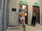 12 January 2014; Jack O'Connor age 11, from Tullamore, Co. Offaly, looks on as Niall McNamee leads out the Offaly team from the dressing rooms ahead of the game. Bord na Mona O'Byrne Cup, Group A, Round 3, Offaly v Wexford, O'Connor Park, Tullamore, Co. Offaly. Picture credit: Barry Cregg / SPORTSFILE