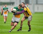 12 January 2014; Ruairi Allen, Offaly, in action against Paddy Byrne, Wexford. Bord na Mona O'Byrne Cup, Group A, Round 3, Offaly v Wexford, O'Connor Park, Tullamore, Co. Offaly. Picture credit: Barry Cregg / SPORTSFILE