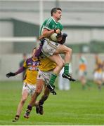 12 January 2014; Niall Smith, Offaly, in action against Brian Malone, Wexford. Bord na Mona O'Byrne Cup, Group A, Round 3, Offaly v Wexford, O'Connor Park, Tullamore, Co. Offaly. Picture credit: Barry Cregg / SPORTSFILE