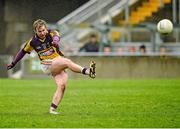12 January 2014; Ben Brosnan, Wexford, takes a successful free kick. Bord na Mona O'Byrne Cup, Group A, Round 3, Offaly v Wexford, O'Connor Park, Tullamore, Co. Offaly. Picture credit: Barry Cregg / SPORTSFILE