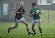 12 January 2014; Emlyn Mulligan, Leitrim, in action against James Kavanagh, Galway. FBD League, Section B, Round 2, Galway v Leitrim, Duggan Park, Ballinasloe, Co. Galway. Picture credit: Diarmuid Greene / SPORTSFILE