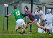 12 January 2014; Leitrim's Ray Cox scores his side's first goal past Galway's Paddy Maguire and goalkeeper Nathan King. FBD League, Section B, Round 2, Galway v Leitrim, Duggan Park, Ballinasloe, Co. Galway. Picture credit: Diarmuid Greene / SPORTSFILE