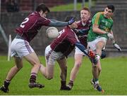 12 January 2014; Emlyn Mulligan, Leitrim, has his shot blocked down by James Shaughnessy, Joss Moore and Tom Fahy, Galway. FBD League, Section B, Round 2, Galway v Leitrim, Duggan Park, Ballinasloe, Co. Galway. Picture credit: Diarmuid Greene / SPORTSFILE