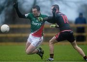12 January 2014; Darren Coen, Mayo, is tackled by Michael McWeeney, IT Sligo, which resulted in a penalty being awarded. FBD League, Section A, Round 2, Mayo v IT Sligo, Connacht GAA centre of excellence, Bballyhaunis, Co. Mayo. Picture credit: David Maher / SPORTSFILE