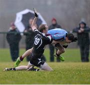 12 January 2014; Ronan Steede, Galway IT, appears to 'drag down his opponent John Quinn, of Sligo, and was later shown a black card for the offence. FBD League, Section B, Round 2, Sligo v Galway IT, Páirc Uí Chonghaile, Collooney, Co. Sligo. Picture credit: Ray McManus / SPORTSFILE