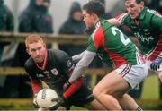 12 January 2014; Ross Donovan, IT Sligo, in action against Enda Varley and Cathal Freeman, Mayo. FBD League, Section A, Round 2, Mayo v IT Sligo, Connacht GAA centre of excellence, Ballyhaunis, Co. Mayo. Picture credit: David Maher / SPORTSFILE