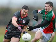 12 January 2014; Evan Regan, IT Sligo, in action against Keith Rogers, Mayo. FBD League, Section A, Round 2, Mayo v IT Sligo, Connacht GAA centre of excellence, Ballyhaunis, Co. Mayo. Picture credit: David Maher / SPORTSFILE